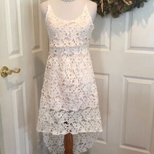 Haute Rogue white lace dress, peach slip